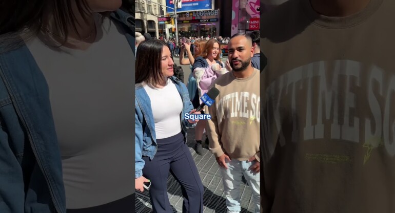 Solar eclipse: New Yorkers watch on in Times Square ππ