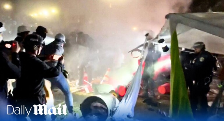 UCLA pro-Palestine protestors clash with police as they break up camp