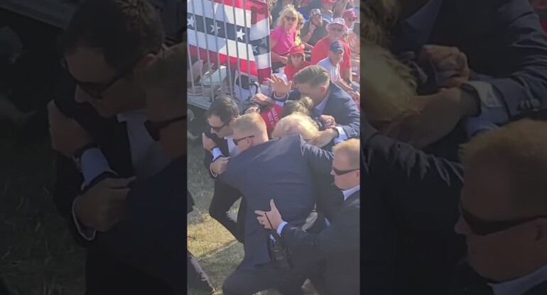 NEW footage of Secret Service rushing Trump to car