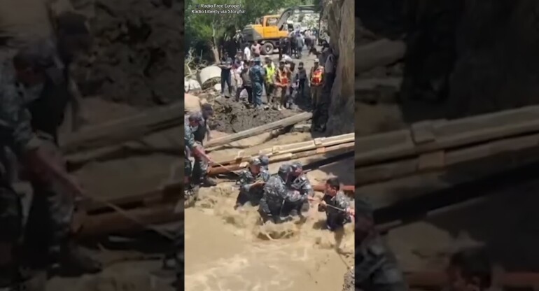 Rescue workers battle RAGING flood waters in Kyrgyzstan