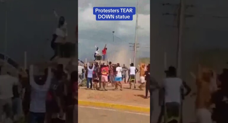 Venezuelan protesters tear down statue of former president Hugo Chavez