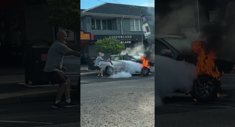 Aussie man doesn't realise his car is on FIRE