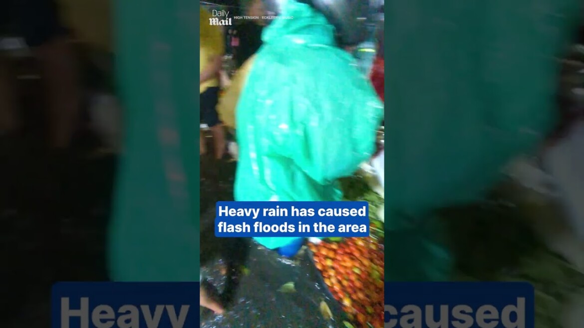 your local bury taxi february 12, 2025 indonesian shoppers wade through knee-deep floods